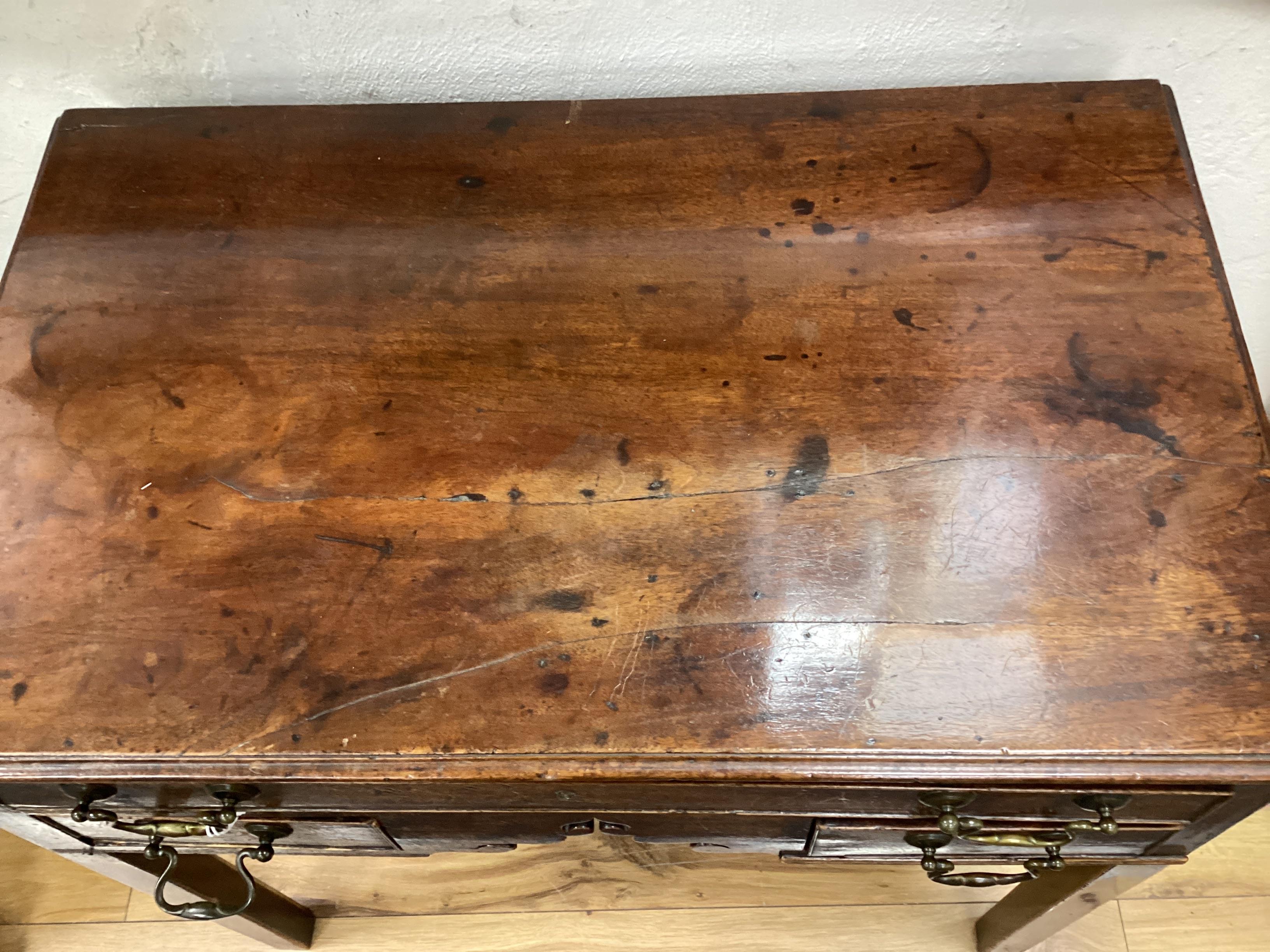 A George III mahogany three drawer side table width 75cm, depth 46cm, height 70cm